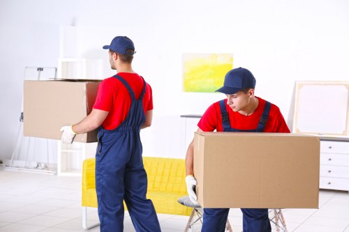House removal team planning a move in Bermondsey residential street