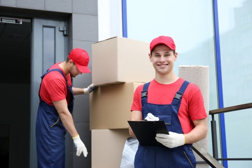 Moving desks and office furniture through a Bermondsey workspace