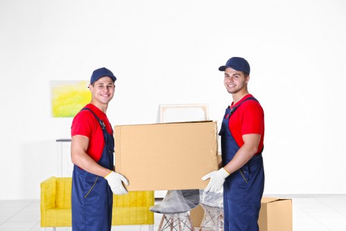 Household furniture being prepared for transport during a Bermondsey move