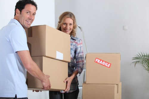 Moving furniture through a Bermondsey flat stairwell with care